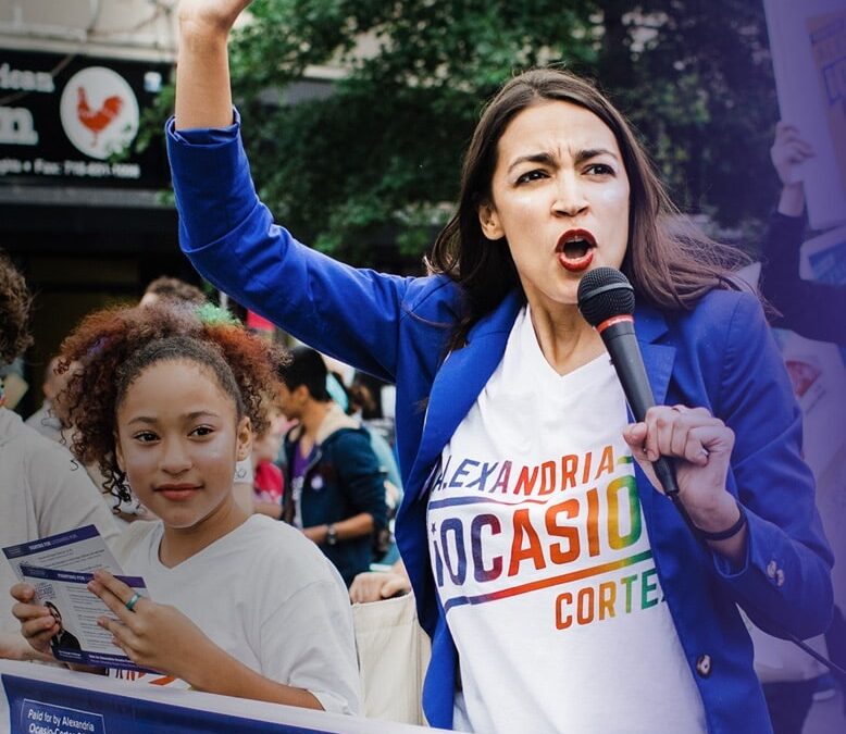 Alexandria Ocasio Cortez wearing custom merch t-shirt union printed by Worx